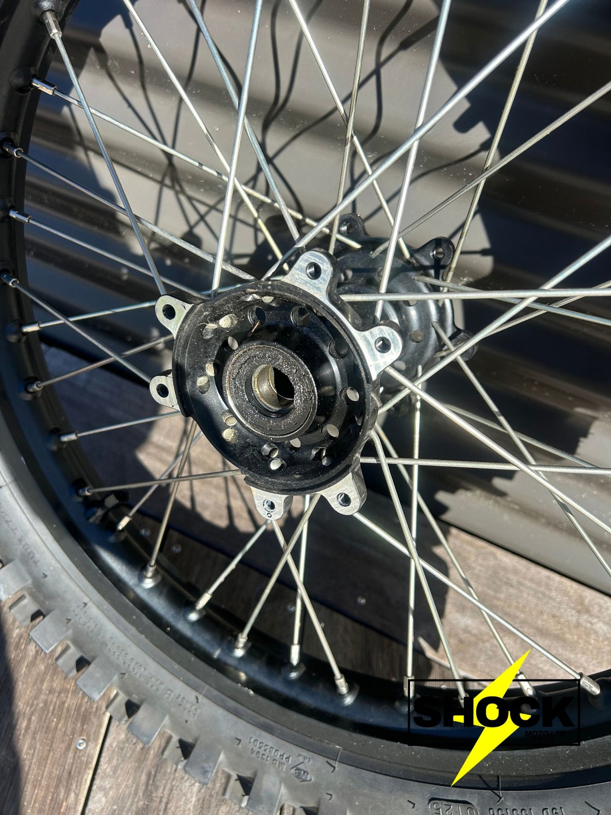 Surron Ultra Bee 19-Inch Rear Wheel + New Maxi Grip Tyre – Pre-Owned - Shock Moto Ltd
