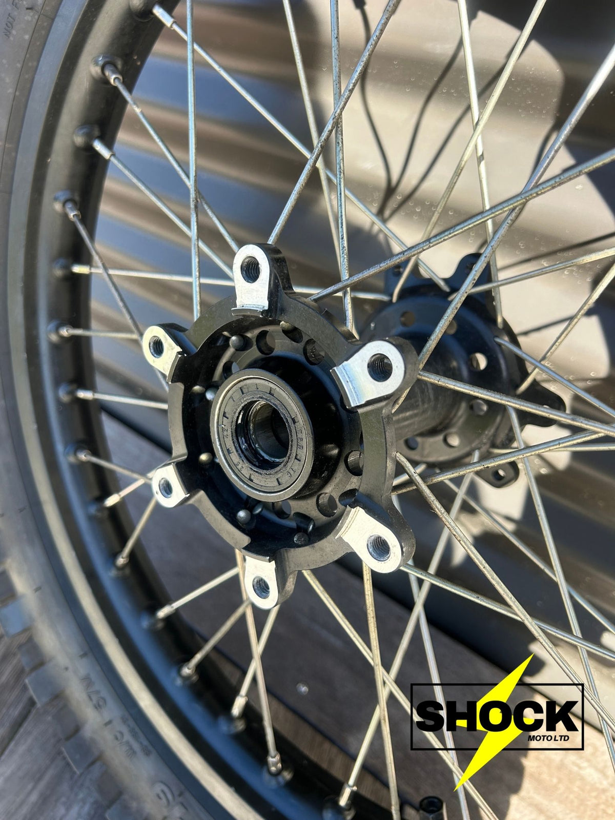 Surron Ultra Bee 19-Inch Rear Wheel + New Maxi Grip Tyre – Pre-Owned - Shock Moto Ltd